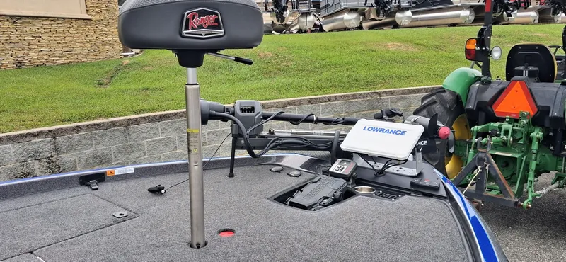 Slide: The Image of 2024 Ranger Z521R boat with Lowrance electronics and tractor in background. - 18