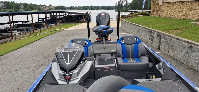 Slide: The Image of 2024 Ranger Z521R boat at lakeside with modern seating. - 19