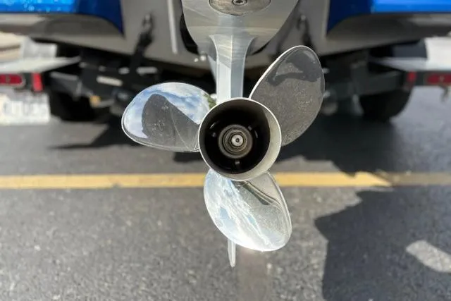 Slide: The Image of Propeller of a 2021 Caymas CX 19 boat, close-up view. - 18