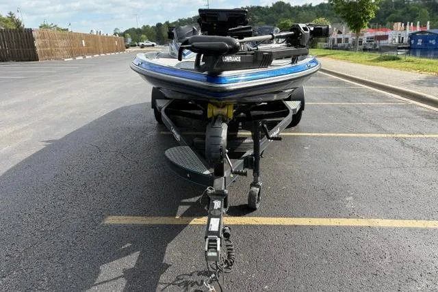 Slide: The Image of 2021 Caymas CX 19 boat on trailer in parking lot, front view. - 30