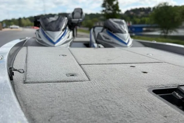 Slide: The Image of 2021 Caymas CX 19 boat deck with two seats, outdoors. - 31