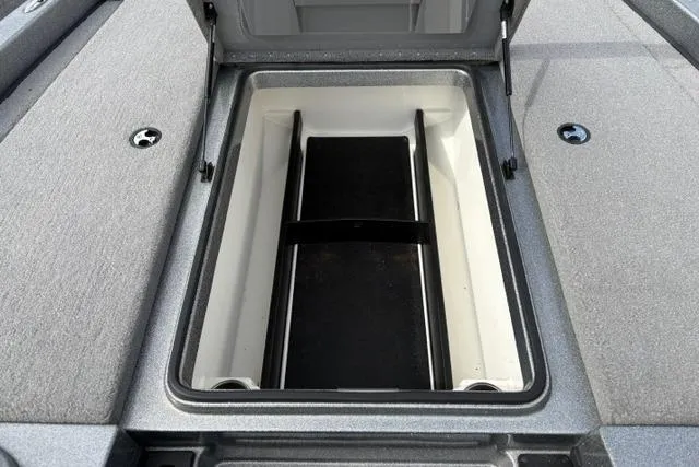 Slide: The Image of Open storage compartment on 2021 Caymas CX 19 boat, showcasing spacious interior. - 42