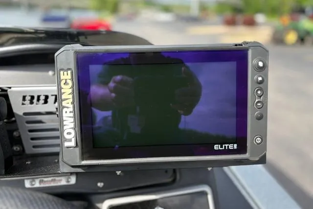 Slide: The Image of Lowrance Elite fishfinder on 2021 Caymas CX 19 boat dashboard. - 50
