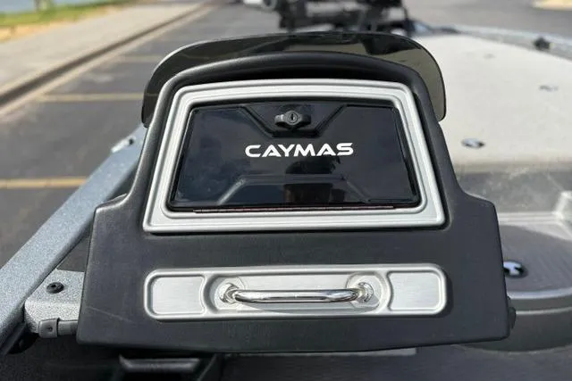 Slide: The Image of 2021 Caymas CX 19 boat dashboard with logo and control panel. - 52