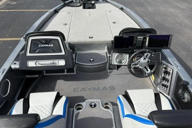 Slide: The Image of 2021 Caymas CX 19 boat interior with advanced navigation system and comfortable seating. - 53