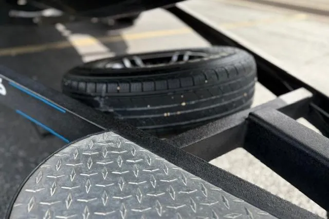 Slide: The Image of 2021 Caymas CX 19 trailer with spare tire and diamond plate step detail. - 54