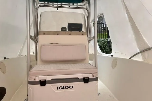Slide: The Image of 2001 Sea Pro 190 Center Console boat interior with Igloo cooler and seating. - 8
