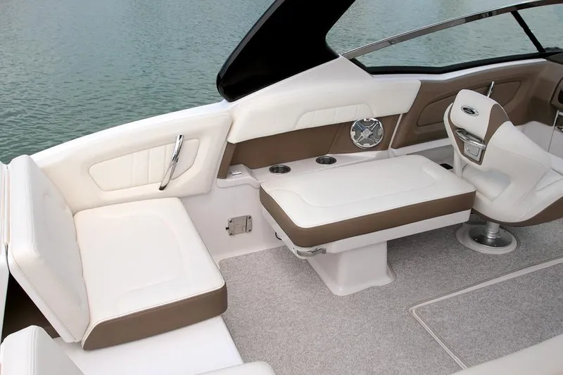 Slide: The Image of Manufacturer Provided Image: 2015 Chaparral 257 SSX boat interior with white and brown seating. - 9