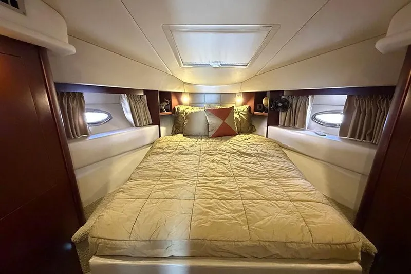 Slide: The Image of Luxurious bedroom interior of 2008 Sea Ray 36 Sedan Bridge yacht. - 21