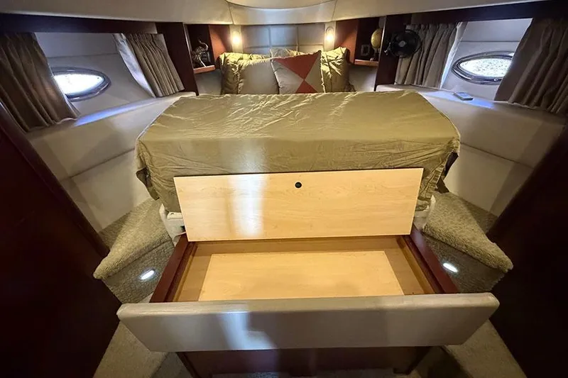 Slide: The Image of Luxurious bedroom interior of 2008 Sea Ray 36 Sedan Bridge yacht with storage drawer. - 22