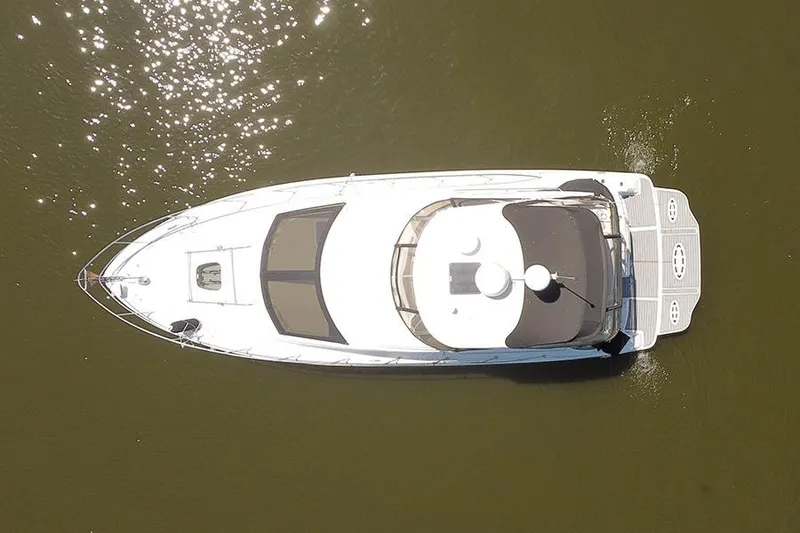 Slide: The Image of Aerial view of 2008 Sea Ray 36 Sedan Bridge yacht on calm water. - 5