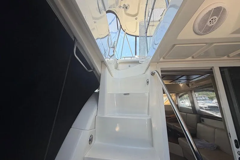 Slide: The Image of Staircase leading to the bridge on a 2008 Sea Ray 36 Sedan Bridge yacht. - 7