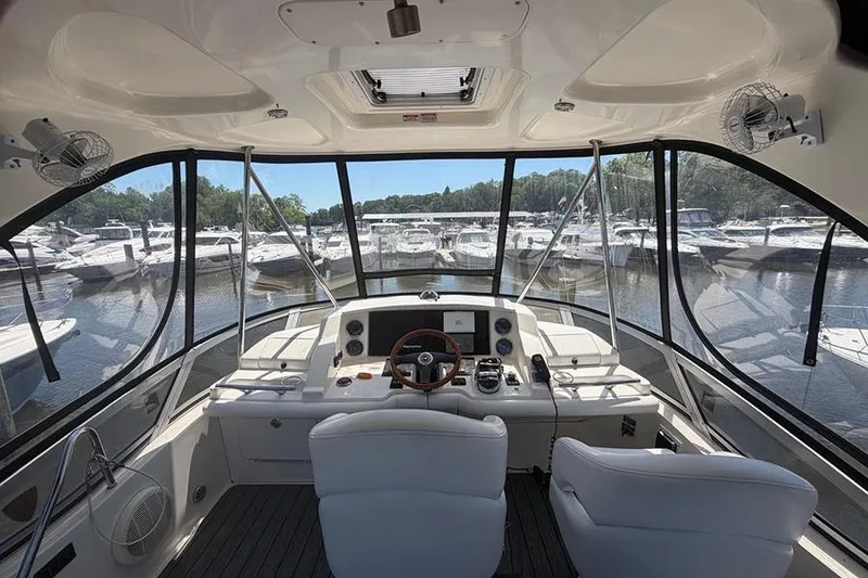 Slide: The Image of Interior view of 2008 Sea Ray 36 Sedan Bridge yacht at marina. - 9