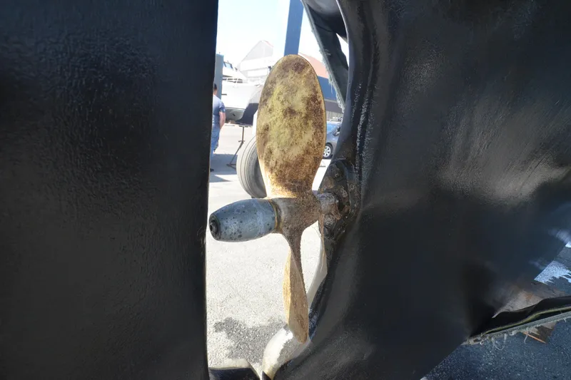 Slide: The Image of Propeller of 1988 Gulf Pilot House boat, close-up view. - 17