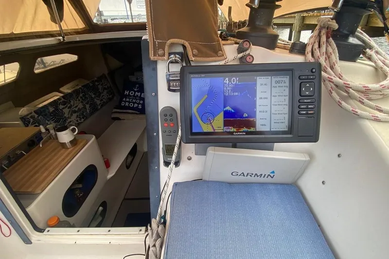 Slide: The Image of Interior of a 1991 Corsair F27 sailboat with Garmin navigation system. - 16