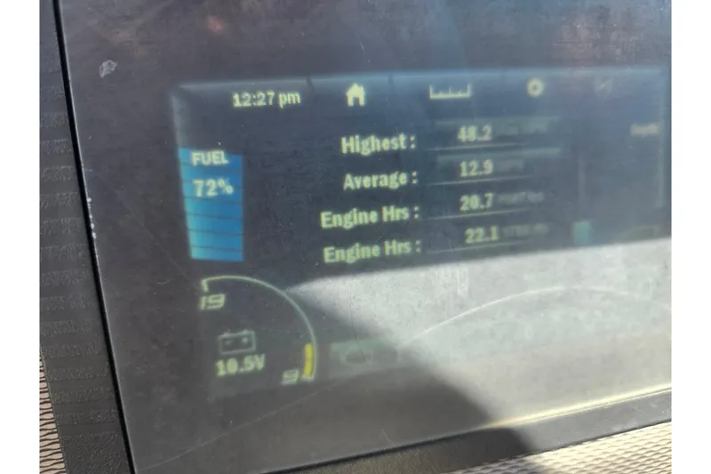 Slide: The Image of Dashboard of a 2019 Yamaha Boats SX210 showing fuel level at 72% and engine hours. - 12