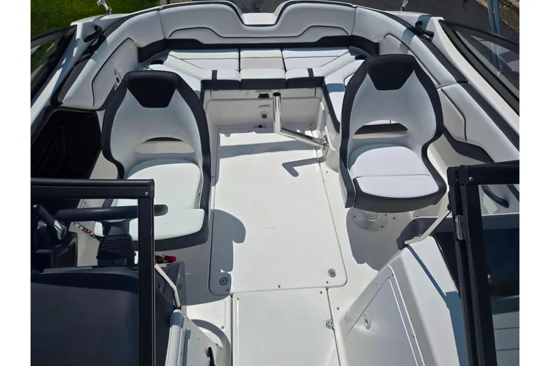 Slide: The Image of 2019 Yamaha Boats SX210 interior with white seating and modern design. - 20