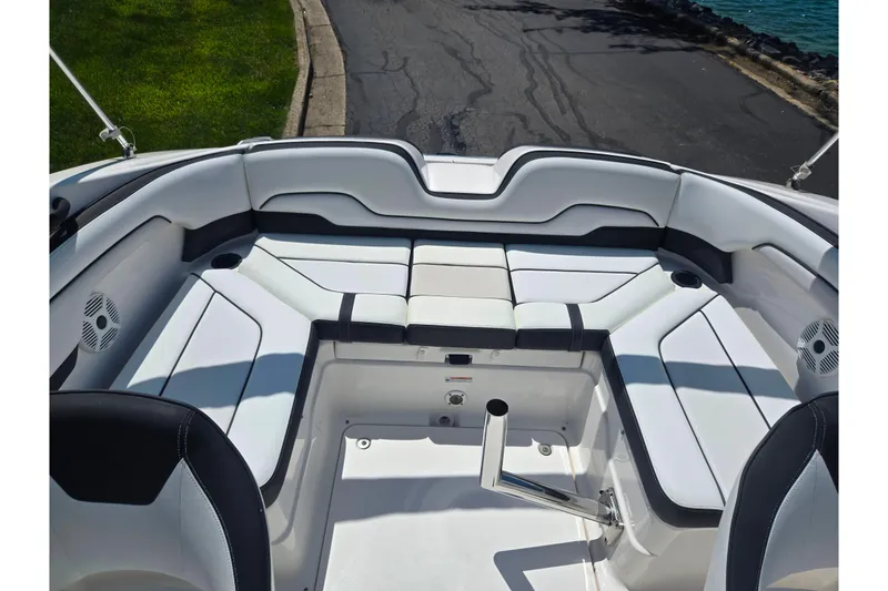 Slide: The Image of 2019 Yamaha Boats SX210 interior with spacious seating and modern design. - 21