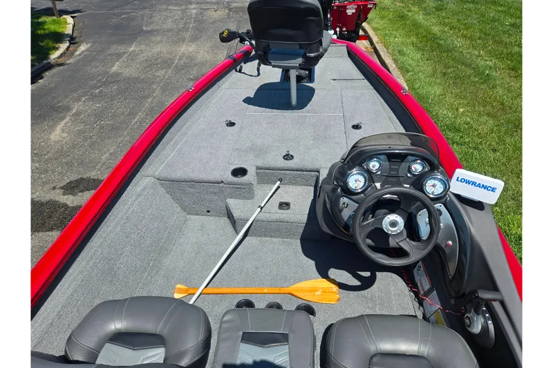 Slide: The Image of 2019 Tracker Pro Team 175 TXW boat interior with steering console and Lowrance electronics. - 11