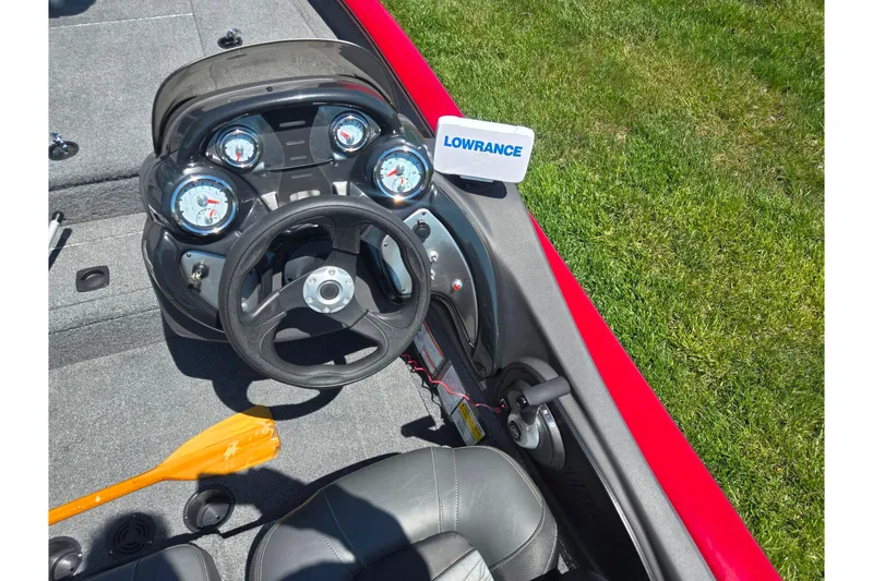 Slide: The Image of 2019 Tracker Pro Team 175 TXW boat dashboard with steering wheel and Lowrance device. - 12