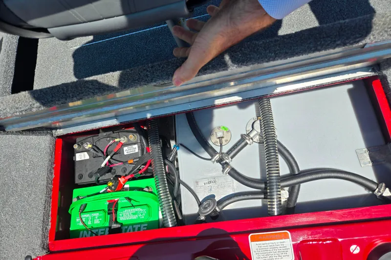 Slide: The Image of 2019 Tracker Pro Team 175 TXW boat battery compartment with wiring and components. - 22