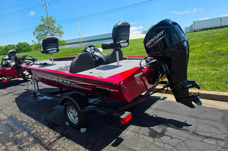 Slide: The Image of 2019 Tracker Pro Team 175 TXW boat with Mercury engine on a sunny day. - 3