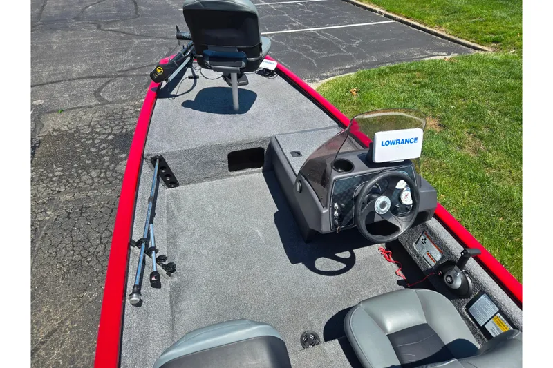 Slide: The Image of 2020 Tracker Pro 160 boat interior with steering console and seating. - 10
