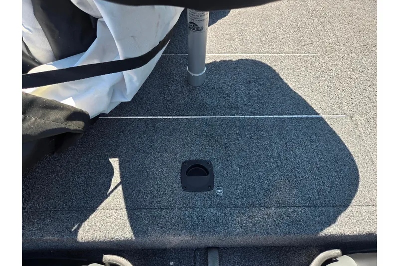 Slide: The Image of 2020 Tracker Pro 160 boat deck with seat mount and storage cover. - 17