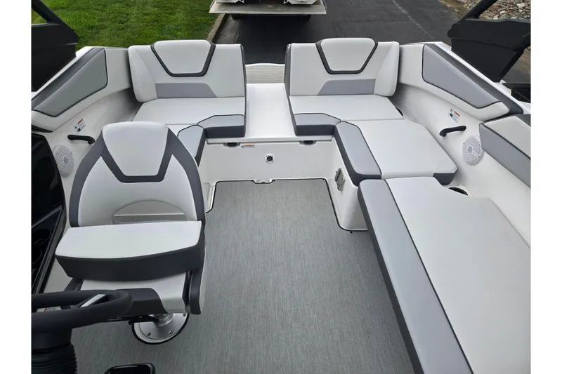 Slide: The Image of 2024 Yamaha Boats AR220 interior with modern seating and sleek design. - 19