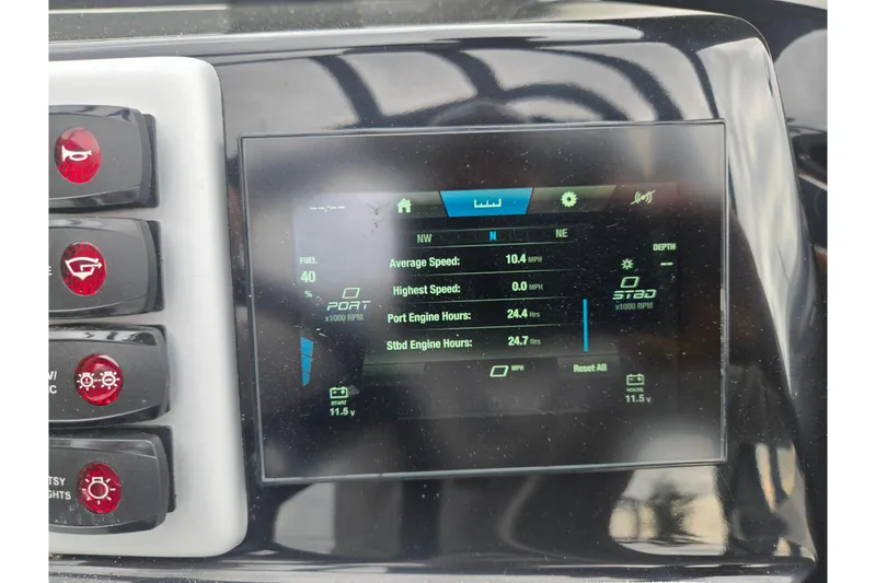 Slide: The Image of 2024 Yamaha Boats AR220 dashboard display showing engine and speed metrics. - 25