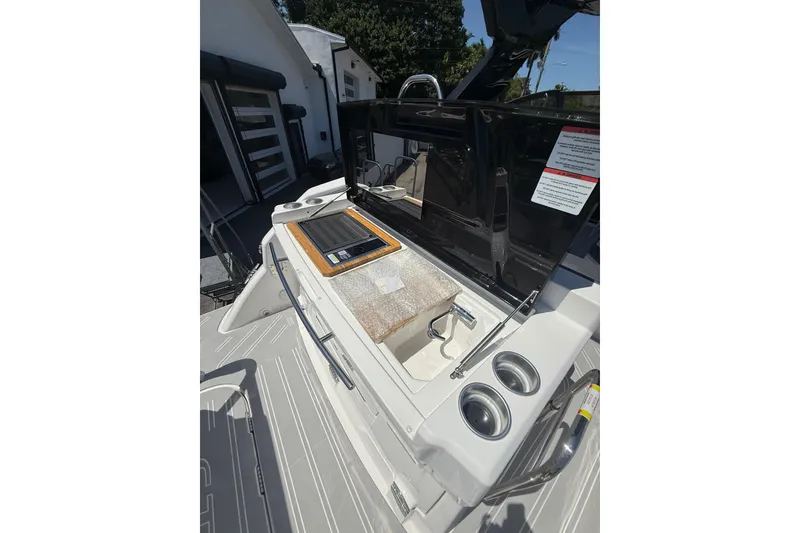 Slide: The Image of 2026 Granfort 300 GTX boat interior with sleek design and modern amenities. - 13
