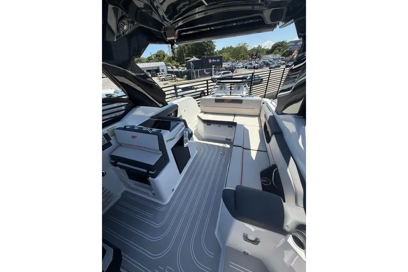 Slide: The Image of Interior of 2026 Granfort 300 GTX boat, featuring sleek seating and modern design elements. - 3