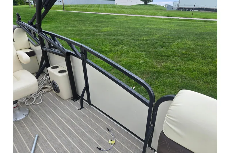 Slide: The Image of Interior of 2022 Lexington 621TT Extreme pontoon boat with seating and speaker. - 18