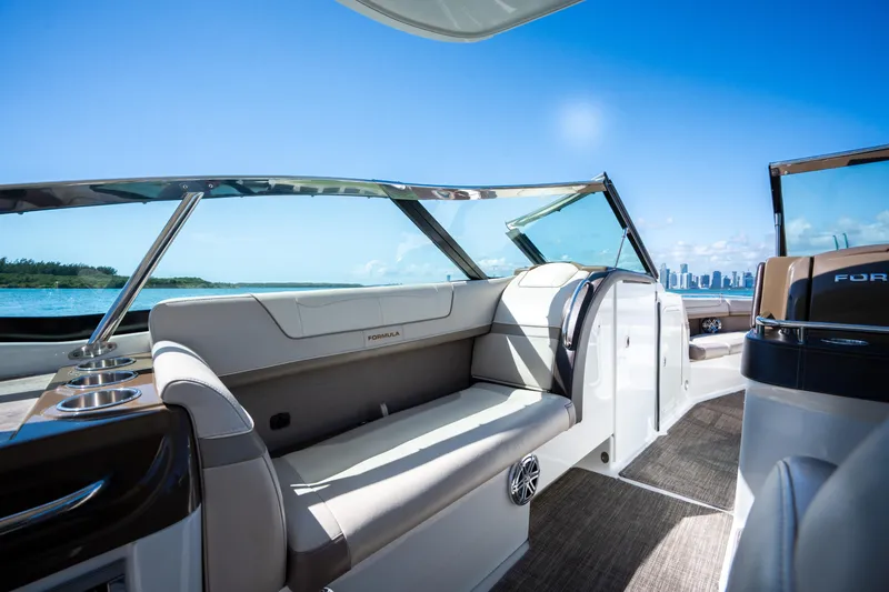 Slide: The Image of 2018 Formula 350 Crossover Bowrider OB interior with luxurious seating and scenic ocean view. - 22