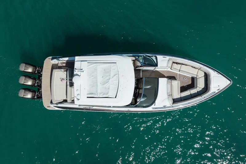 Slide: The Image of Aerial view of 2018 Formula 350 Crossover Bowrider OB on turquoise water. - 8