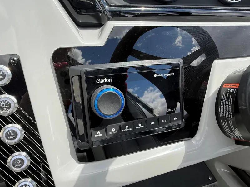 Slide: The Image of Viaggio Lago X-U 22 dashboard featuring Clarion Bluetooth system. - 23