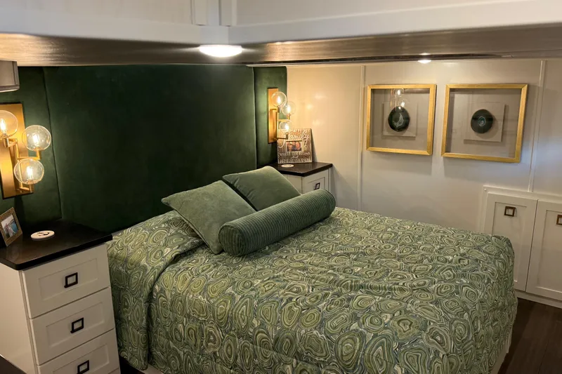 Slide: The Image of Luxurious bedroom in 2020 Thoroughbred 20 x 102, featuring elegant green decor and modern lighting. - 28