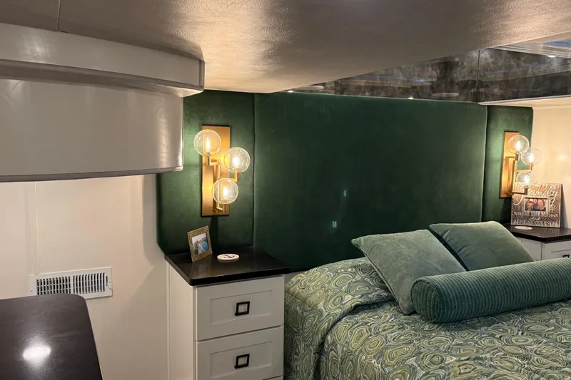 Slide: The Image of Luxurious bedroom interior in 2020 Thoroughbred 20 x 102, featuring elegant lighting and plush bedding. - 38