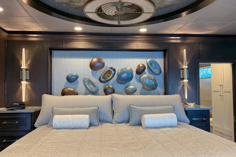 Slide: The Image of Luxurious bedroom interior in 2020 Thoroughbred 20 x 102 model, featuring elegant decor and lighting. - 6