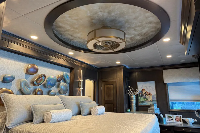 Slide: The Image of Luxurious bedroom interior in a 2020 Thoroughbred 20 x 102, featuring elegant decor and ambient lighting. - 8