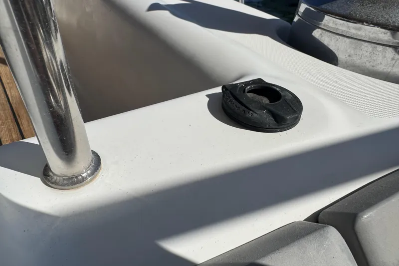 Slide: The Image of Close-up of Beneteau Oceanis 49 yacht deck details, featuring a metal post and fitting. - 26