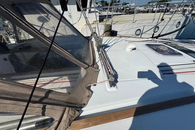 Slide: The Image of Beneteau Oceanis 49 sailboat deck, 2007 model, docked at marina. - 39