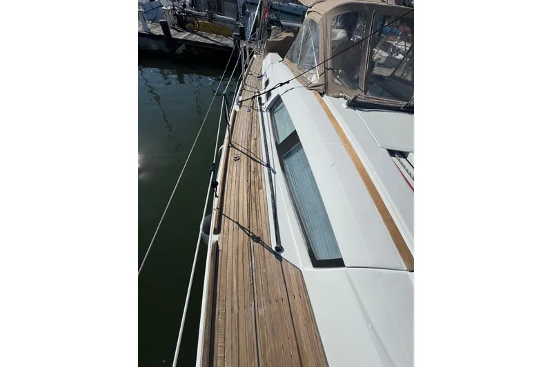 Slide: The Image of Beneteau Oceanis 49 sailboat deck, 2007 model, docked at marina. - 44