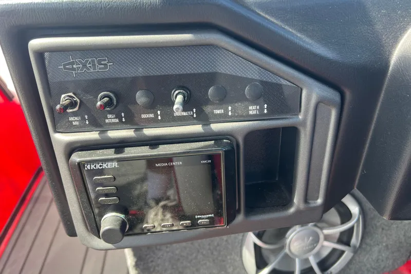 Slide: The Image of Control panel of a 2016 Axis T22 boat with Kicker media center. - 15