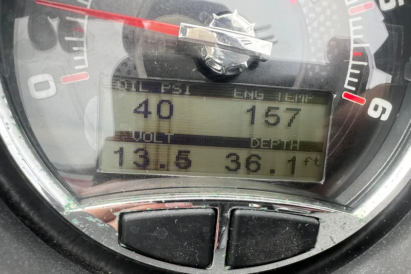 Slide: The Image of Close-up of 2016 Axis T22 dashboard displaying engine metrics and depth reading. - 19