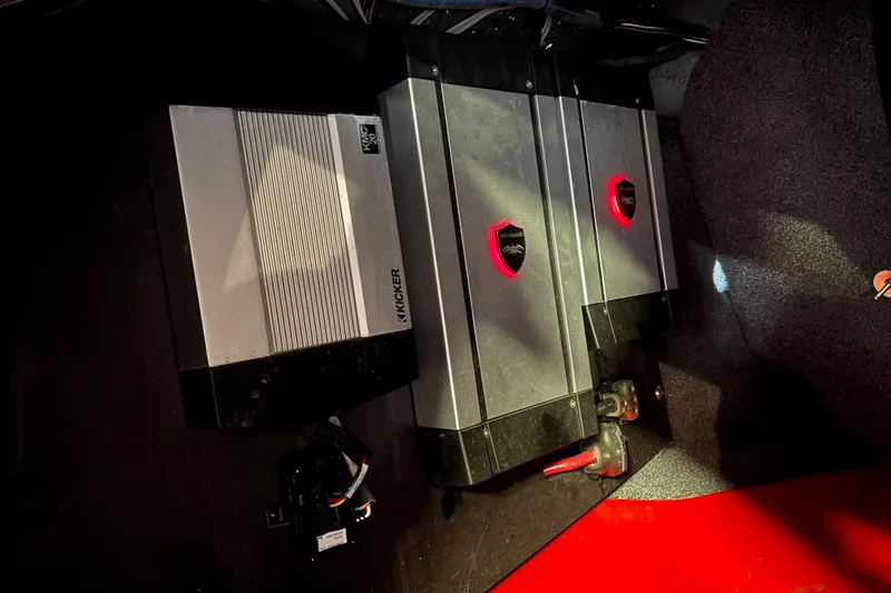 Slide: The Image of Audio amplifiers in a 2016 Axis T22 boat, featuring Kicker and Wet Sounds equipment. - 35