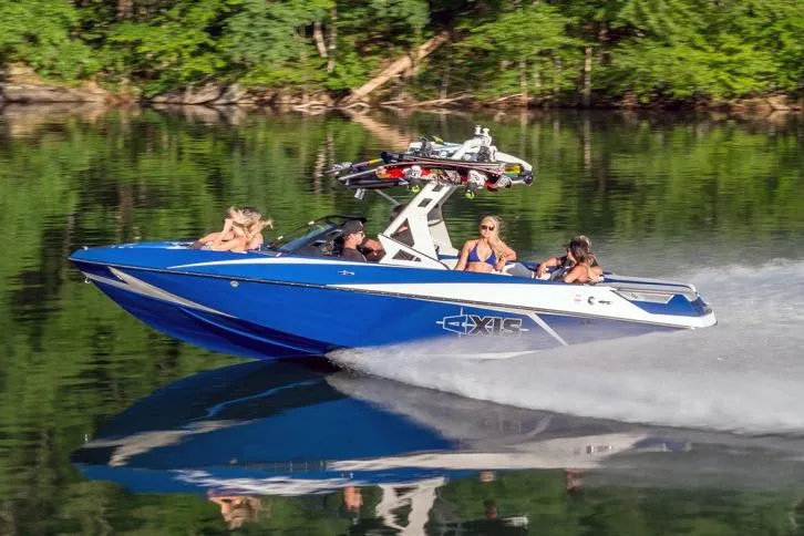 Slide: The Image of Manufacturer Provided Image: 2016 Axis T22 boat cruising on a lake with passengers. - 41