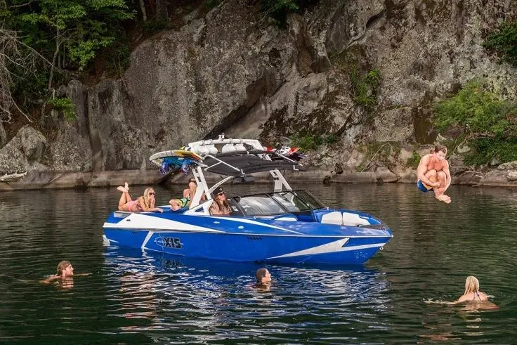 Slide: The Image of Manufacturer Provided Image: 2016 Axis T22 boat on a lake with people swimming and jumping off. - 42