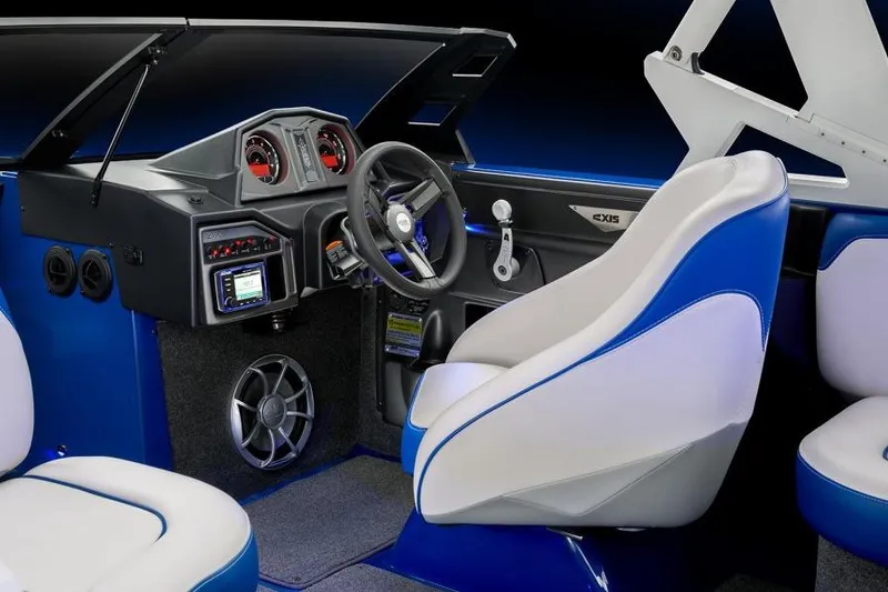 Slide: The Image of Manufacturer Provided Image: 2016 Axis T22 boat interior with blue and white seats, modern dashboard, and steering wheel. - 45