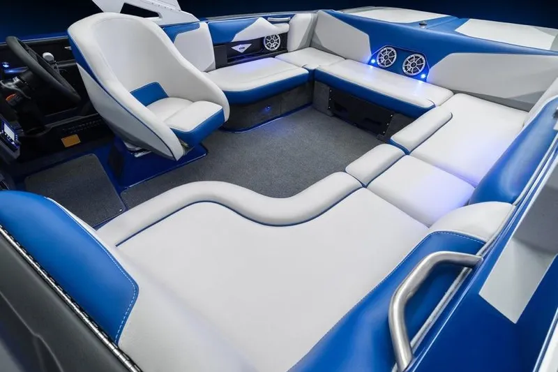 Slide: The Image of Manufacturer Provided Image: 2016 Axis T22 boat interior with blue and white seating, modern design, and LED lighting. - 46